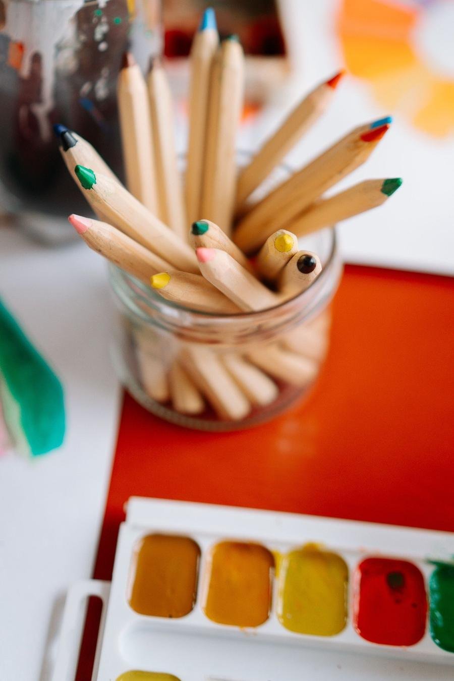 Coloured pencils and paints