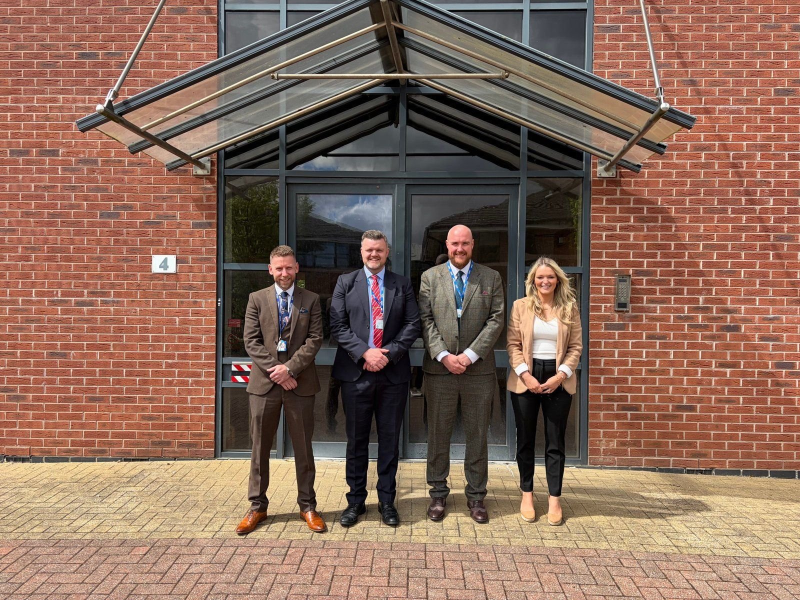 School leaders outside LCE Academy