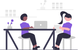 2 people working on laptop sat at a desk vector