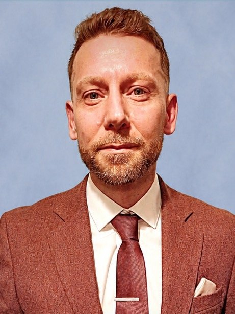 Professional headshot of David Jeal